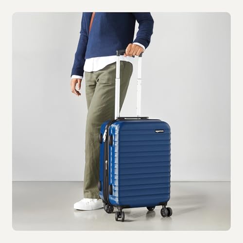 Amazon Basics Hardside Carry-On Luggage 21 inch, Expandable, Scratch-Resistant, Multi-directional Wheels, Navy Blue